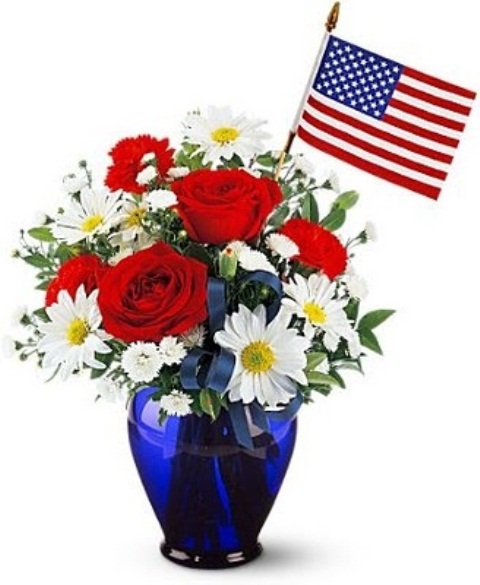 Blue Vase Centerpiece With Red, White, and Blue Flowers