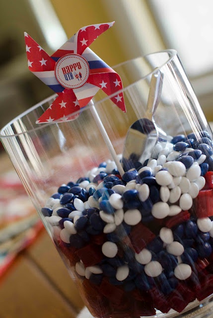Clear Cylinder Filled With Red, White, and Blue Candies
