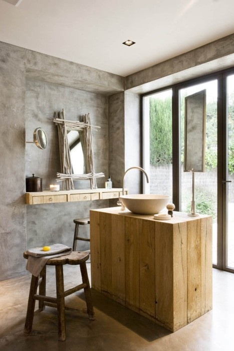 Reclaimed Wood Vanity With Vessel Sink Anchors the Space