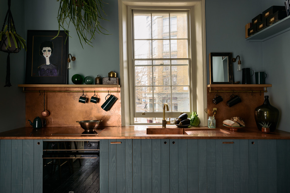 Copper Backsplash With Hanging Hooks For Kitchen Tools