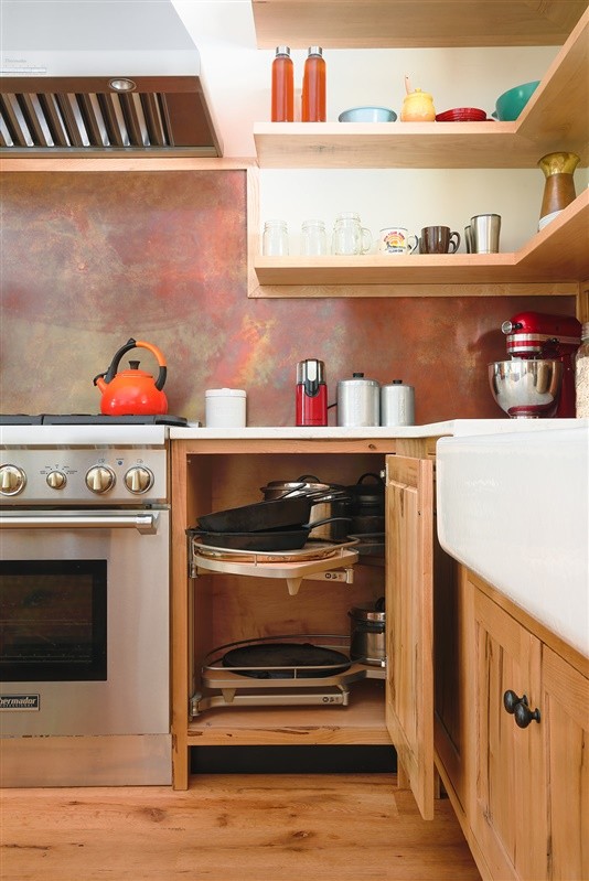 Corner Cabinet With Swiveling Shelves For Pots