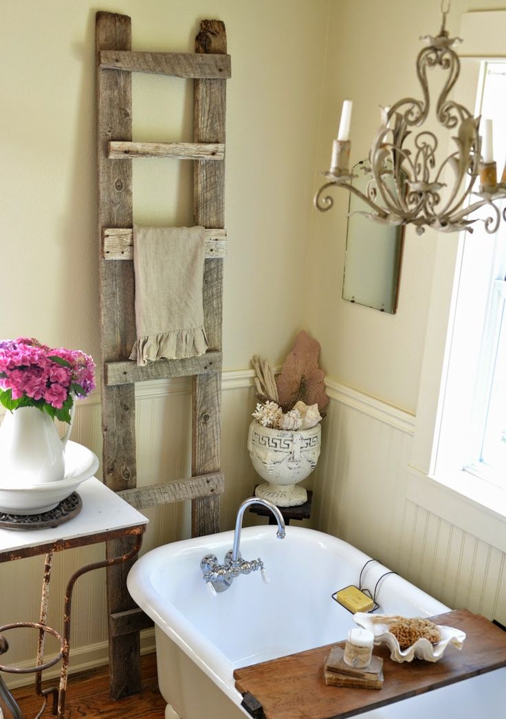 Rustic Ladder Holds Towels and Adds Vertical Interest