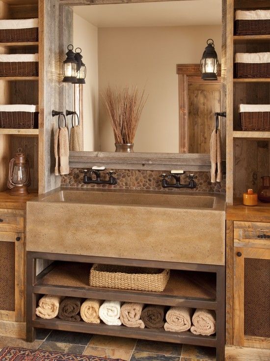 Concrete Sink Base With Open Shelving for Rolled Towels