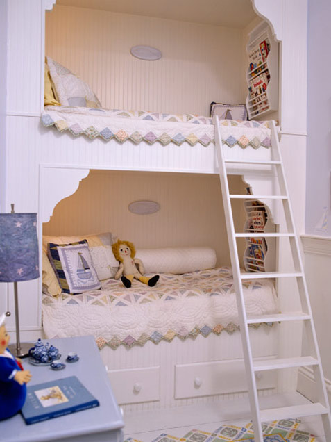 Keep Books Handy With a White Ladder Featuring Magazine Holders