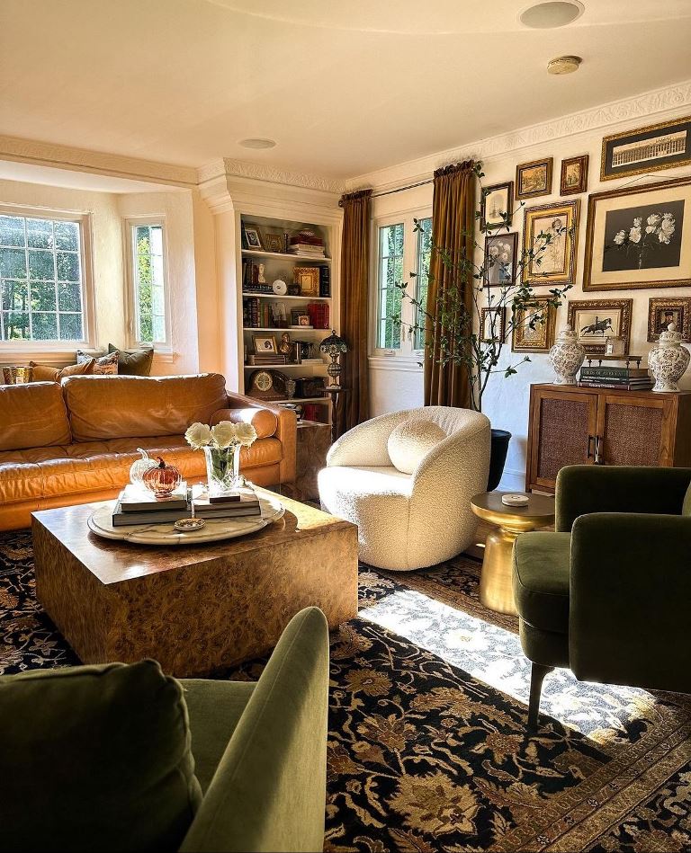 Gallery Wall With Varying Frame Sizes Adds Dynamic Interest