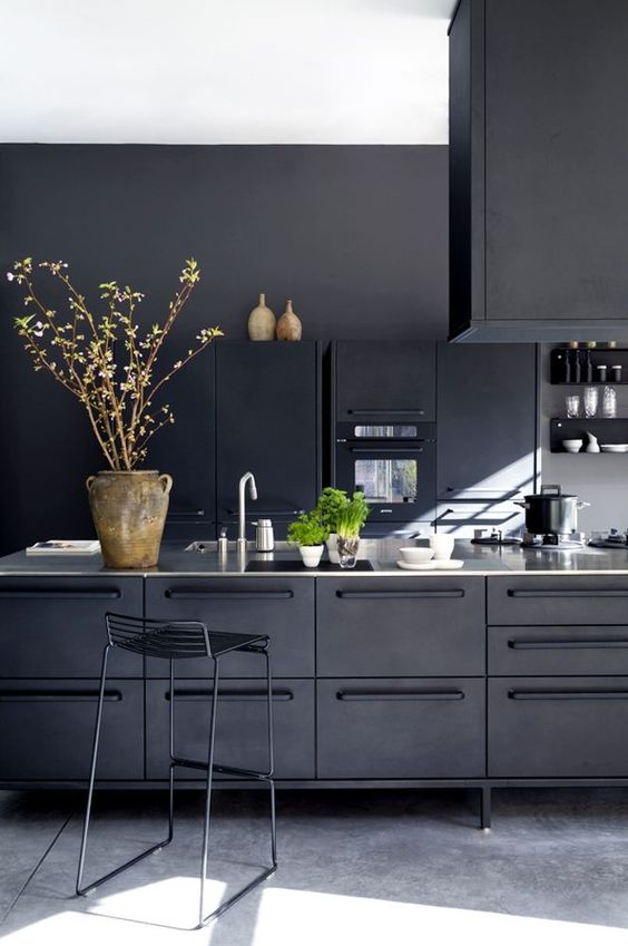 Oversized Rustic Vase Adds Natural Texture to Sleek Countertop