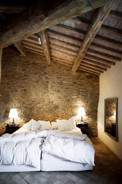 Exposed Wooden Beams Add Architectural Interest To The Ceiling