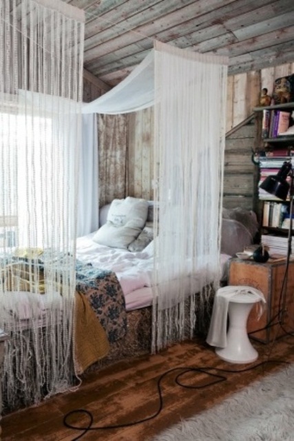 White Tassel Curtains Create Soft Bedside Privacy