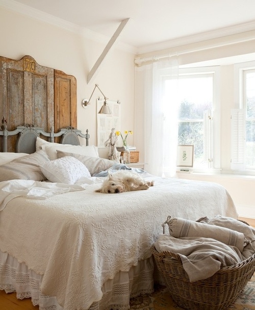 Reclaimed Wooden Doors Create a Rustic Headboard Statement