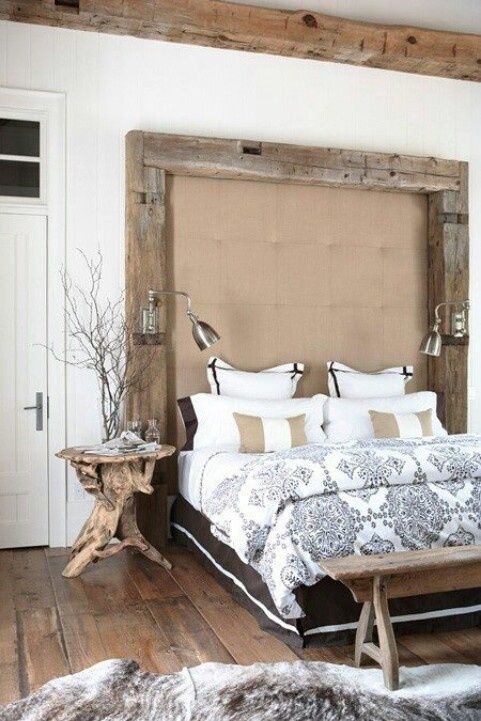 Rough-Hewn Wood Frame Creates a Dramatic Headboard