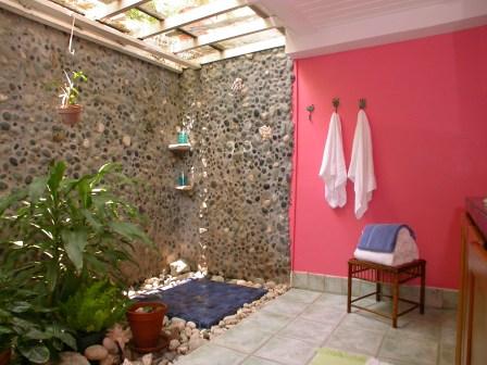 Pebble Walls Create a Natural Shower Enclosure