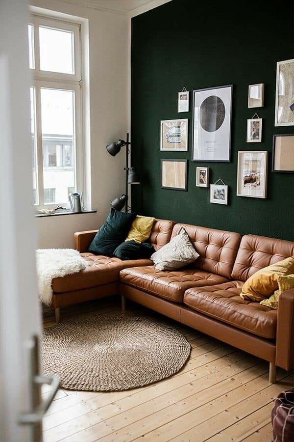 Design a Gallery Wall Above a Tufted Sofa