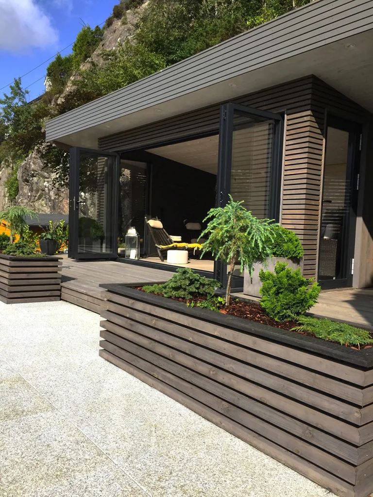 Dark Stained Slatted Planters With Black Trim