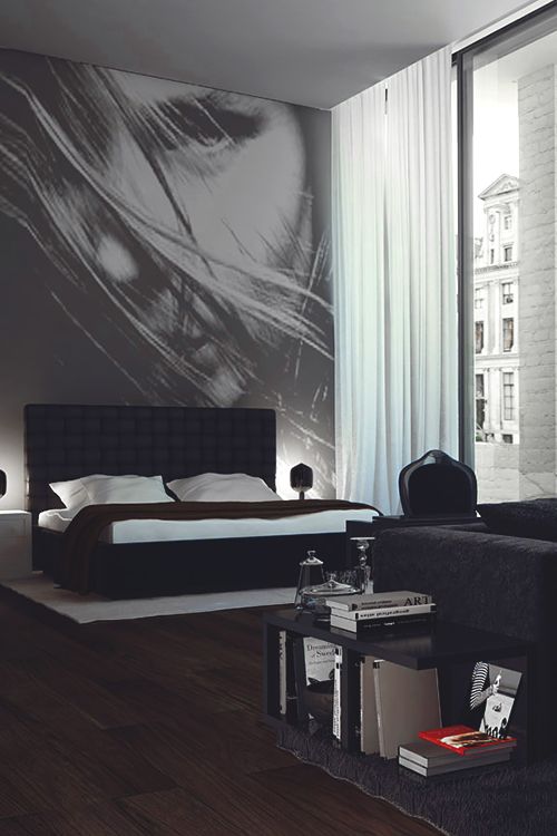 Oversized Portrait Mural Creates Dramatic Bedroom Backdrop