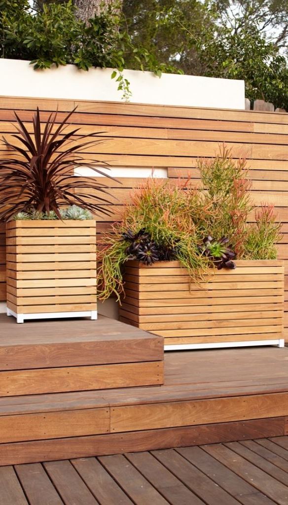 Wooden Planters With White Bases Add Height and Contrast