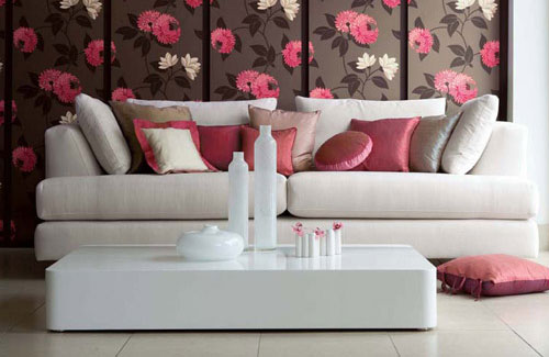 Layered Throw Pillows Add Depth and Texture to a Sofa