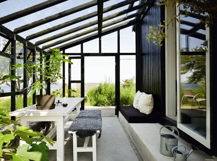 Define Your Space with a Black Sunroom Structure