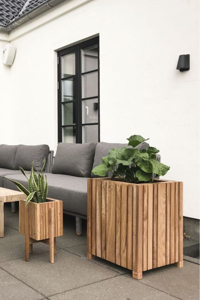 Grouped Wooden Planters Add Varied Heights To Your Patio