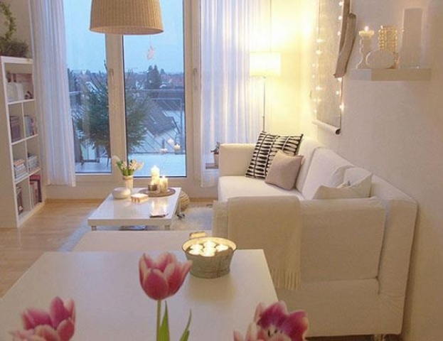 Metal Bucket With Floating Candles Creates Soft Ambiance