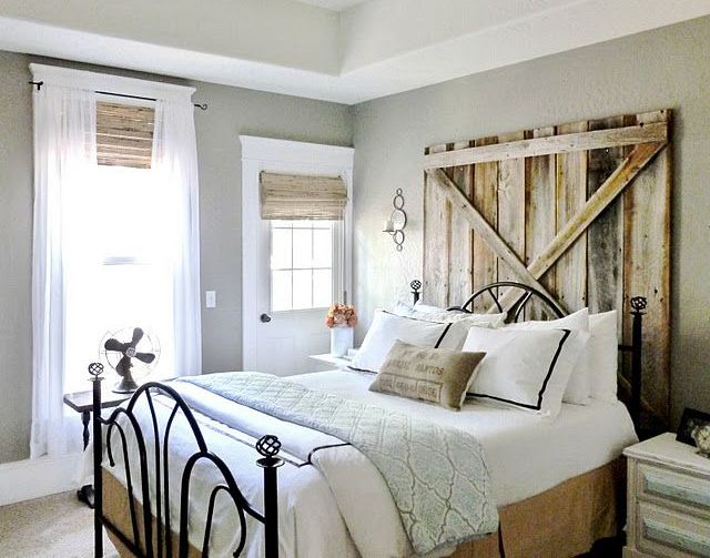 Barn Door Headboard Adds Rustic Charm Behind Bed