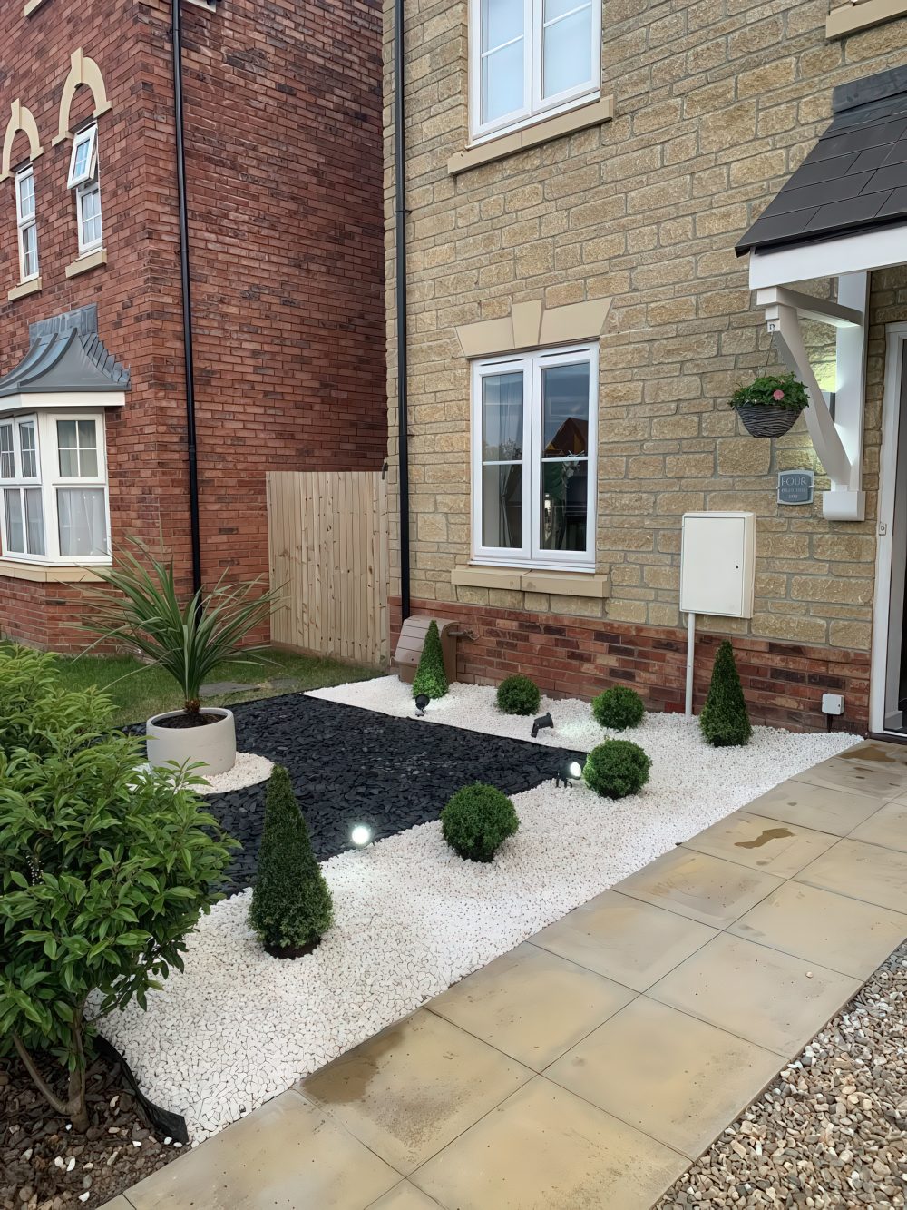 Small Topiary Trees Add Geometric Form to Gravel Beds