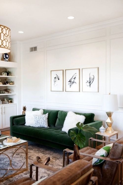 Three Abstract Art Pieces Add Graphic Punch Above a Sofa