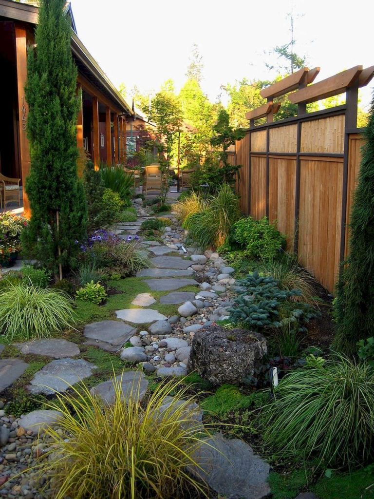 Flagstone Path Softened by Groundcover and River Rocks