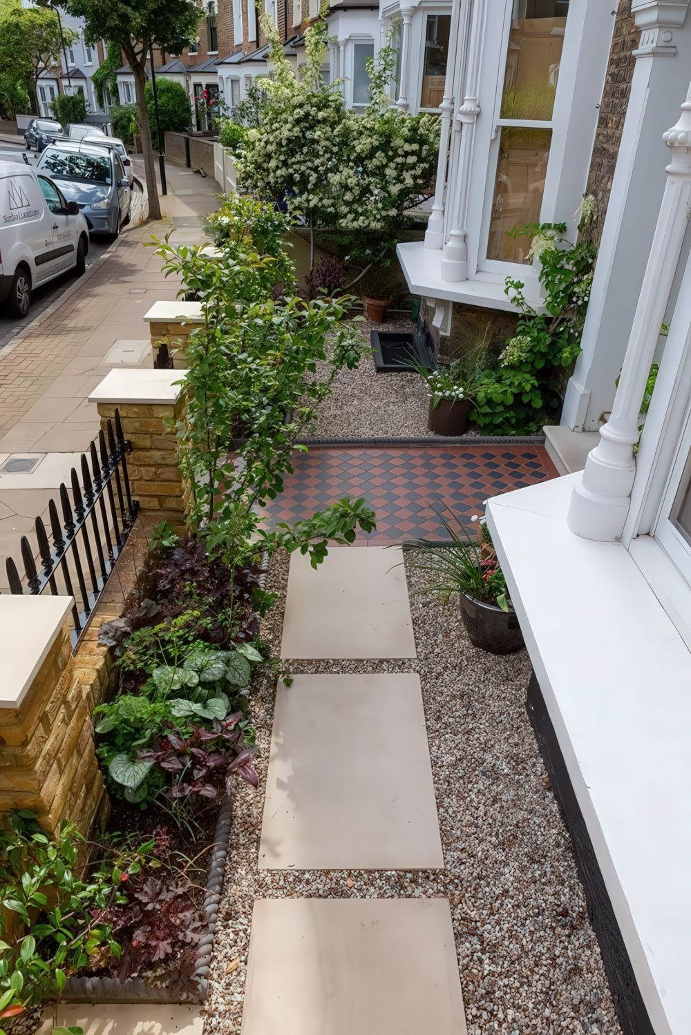 Square Stone Pavers Create a Modern Path Through Gravel