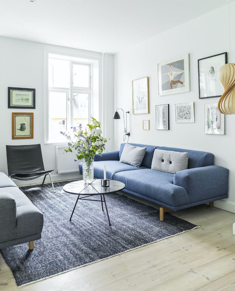 Blue Sofa With Grey Pillows Adds Soft Contrast