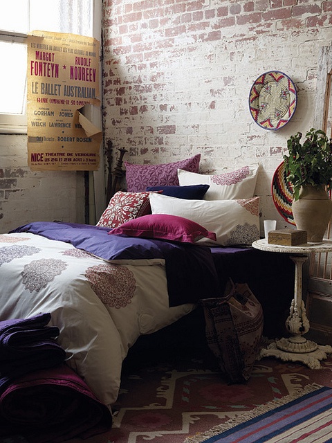 Vintage Poster Adds Character Above Bed