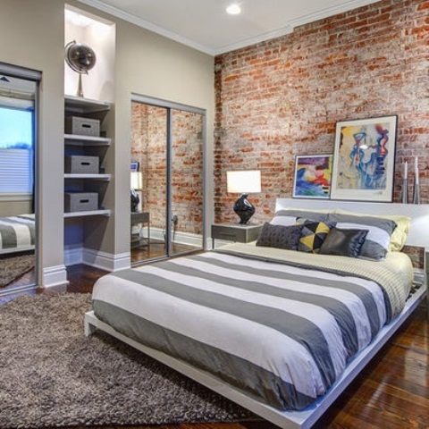Artwork Above Bed Adds Color To Exposed Brick