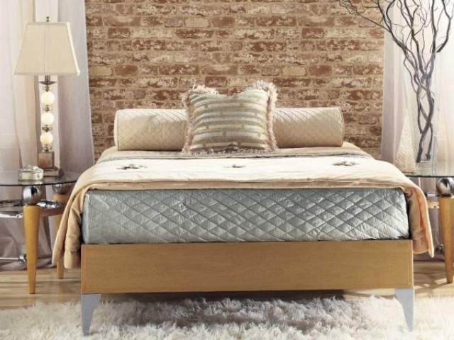 Quilted Bedding Adds Subtle Shine Against Brick