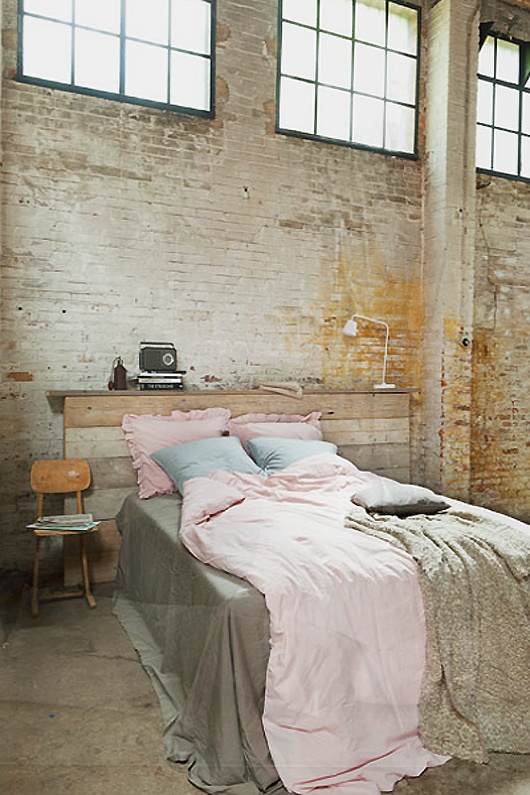 Reclaimed Wood Headboard Doubles as a Floating Shelf