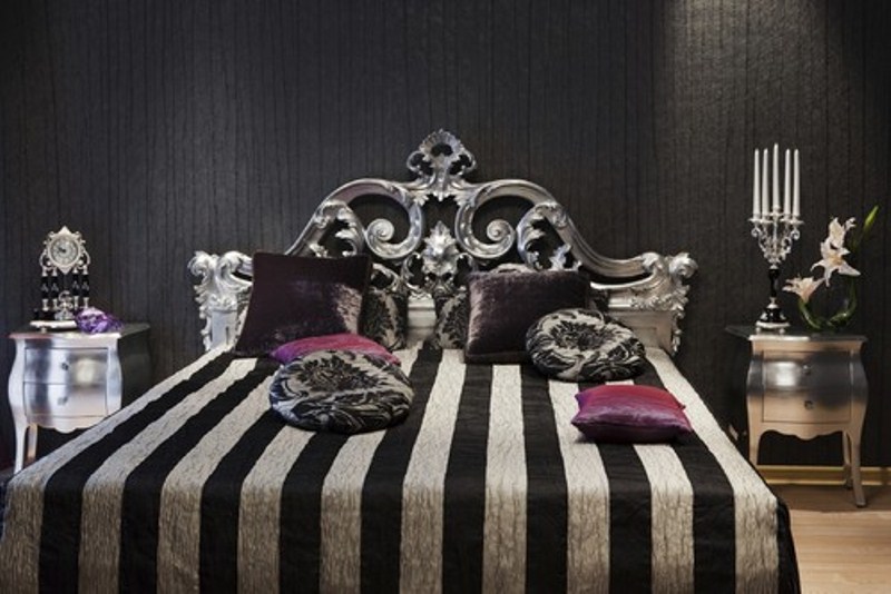 Ornate Silver Headboard Adds Dramatic Flair