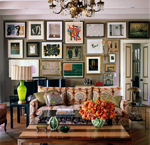 Anchor the Room with a Gallery Wall of Varied Art Styles