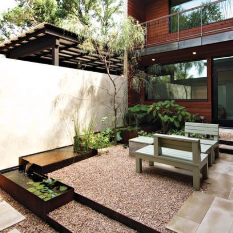 Corten Steel Planters Define Water Channels