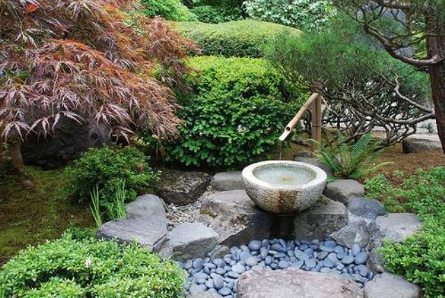 Stone Basin with Bamboo Spout for Soothing Water Sounds