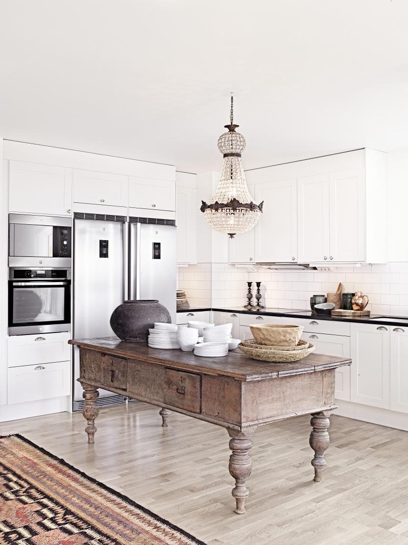 Antique Farmhouse Table Adds Rustic Charm and Display Space