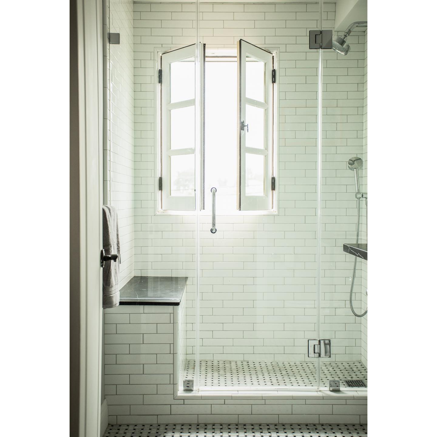 Built-in Shower Bench with Marble Top Offers Towel Storage