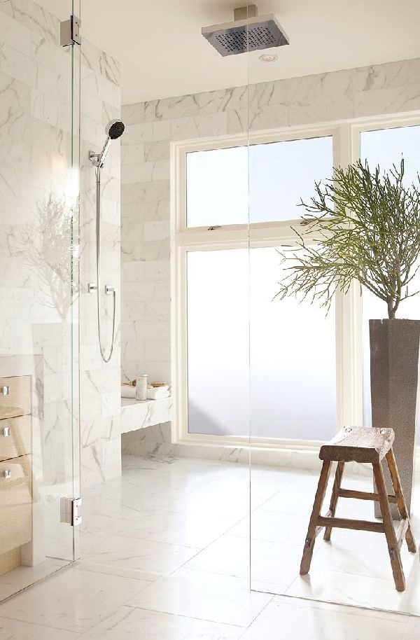 Rustic Wooden Stool Adds Natural Contrast to Marble Bathroom