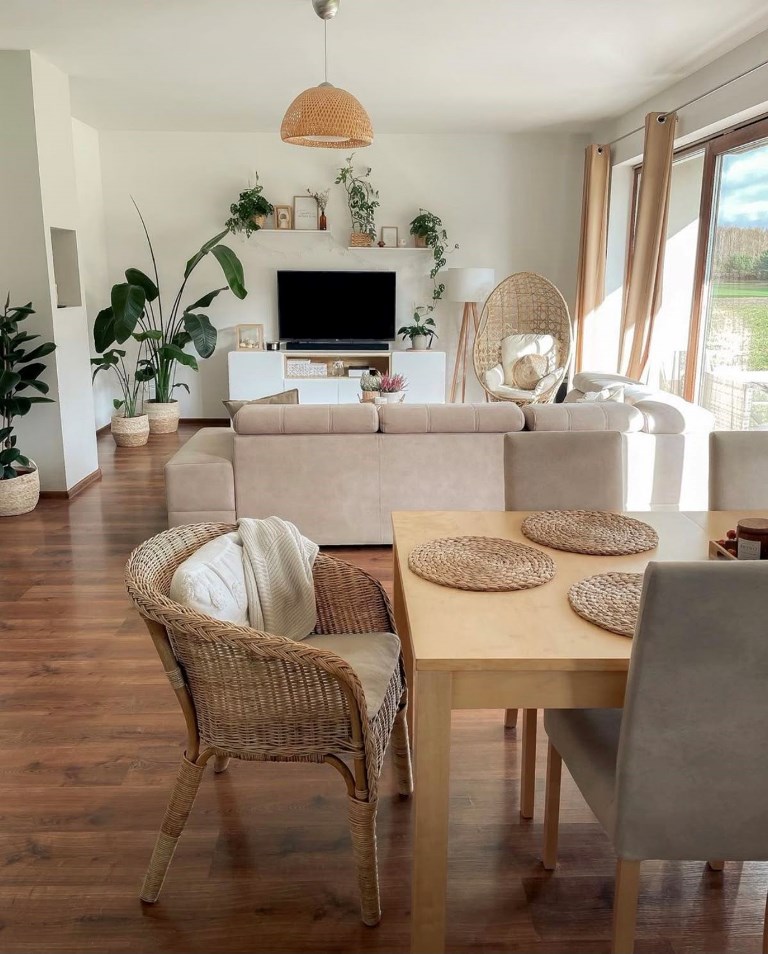 Woven Rattan Chair With Throw Blanket Adds Cozy Seating