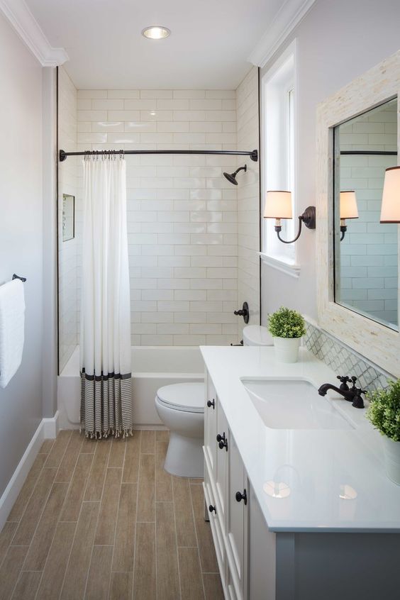 White Subway Tile Shower With Contrasting Black Trim