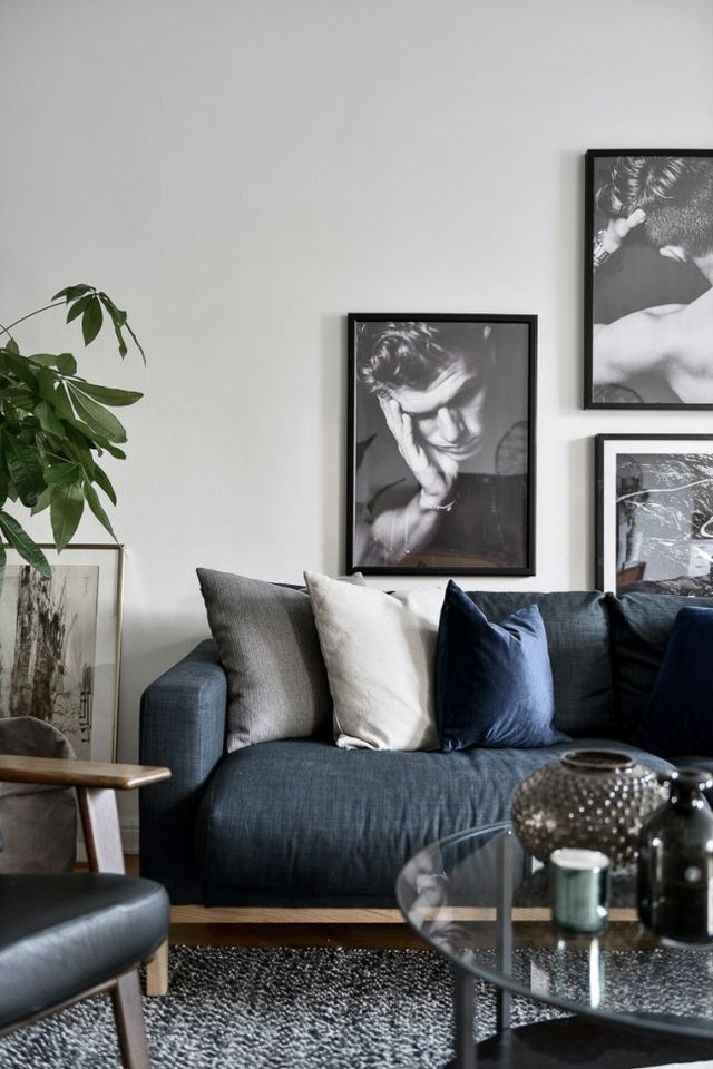 Grouped Black Framed Portraits Add Dramatic Focus
