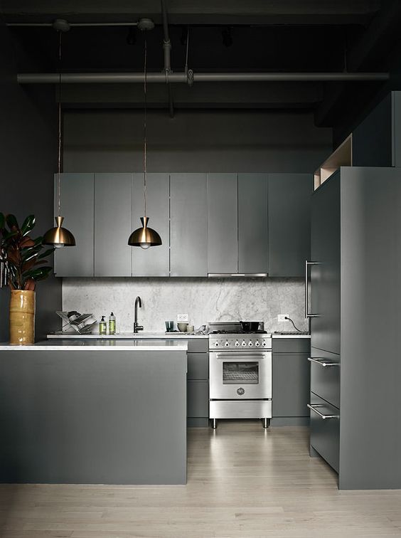Brass Pendant Lights Add Warm Glow to Dark Kitchen