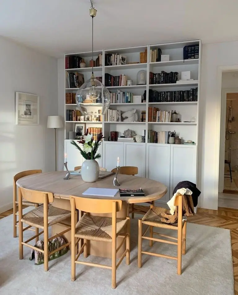 Oval Wood Table With Woven Seat Chairs Creates Natural Dining Area