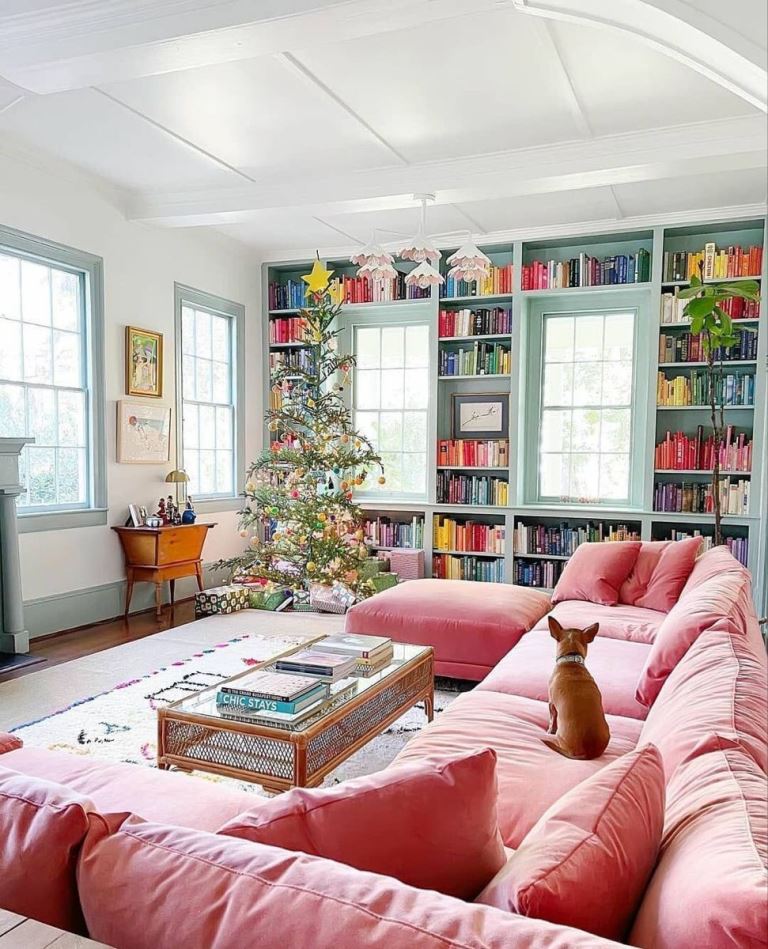 Built-in Bookshelves Frame Windows With Colorful Spines