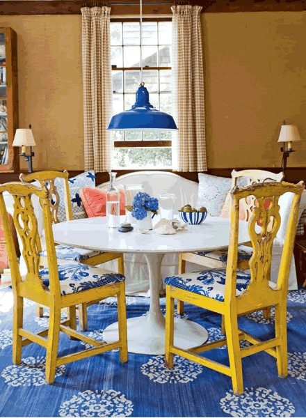 Eclectic Charm with Yellow Chairs and Blue and White Patterned Cushions