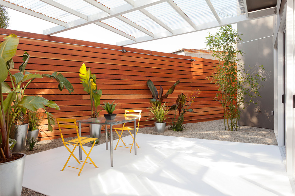 Soften a Horizontal Fence with Tall Bamboo
