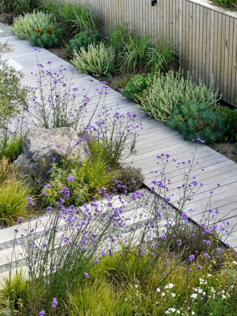 Wide Decking Integrates With Gravel Paths