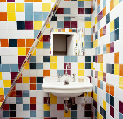 Checkerboard Tile Walls Add Playful Pattern Around Sink